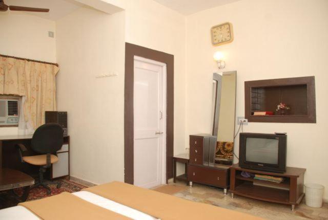 Hotel Royal Ahmadábád Pokoj fotografie