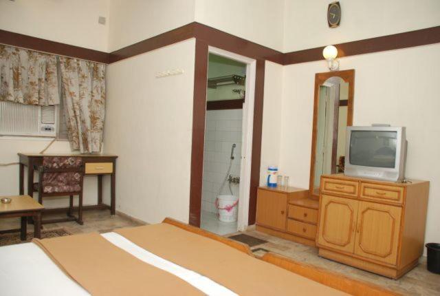 Hotel Royal Ahmadábád Pokoj fotografie